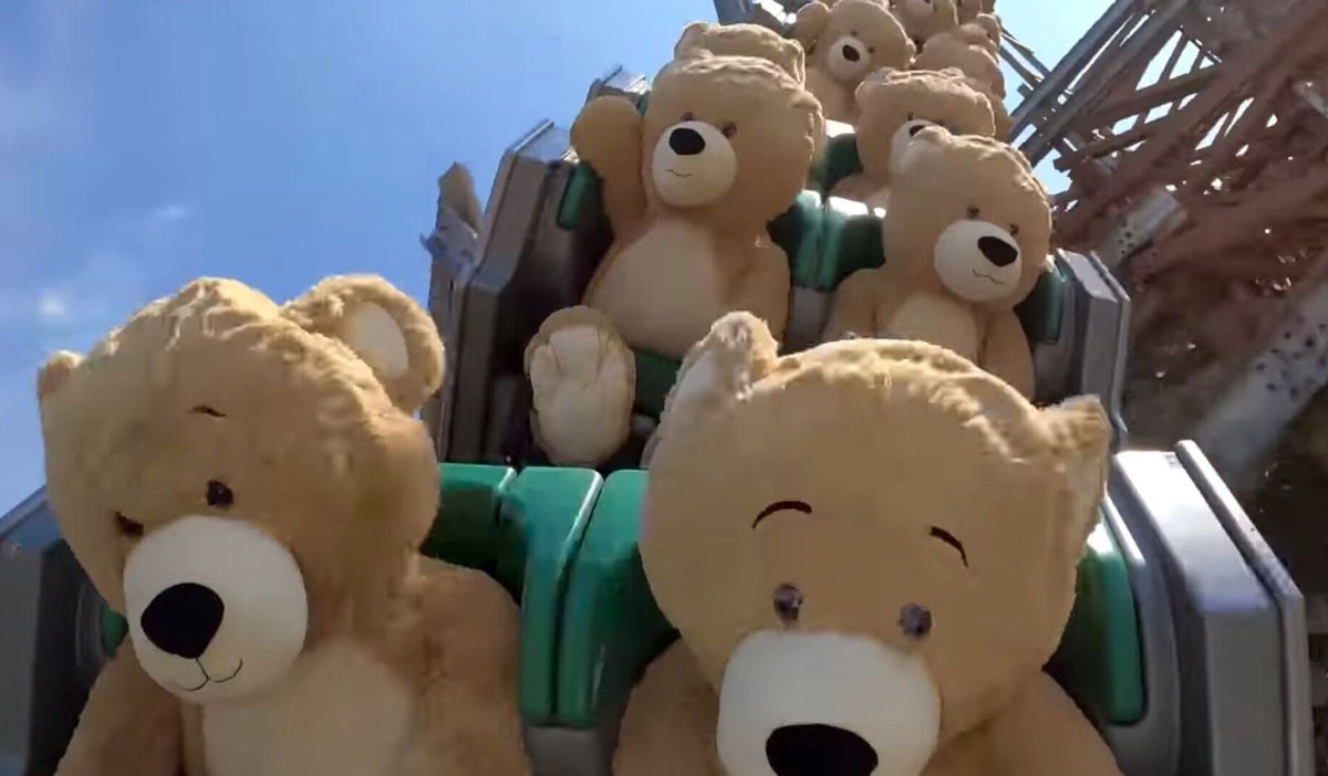 big teddy bears riding a roller coaster